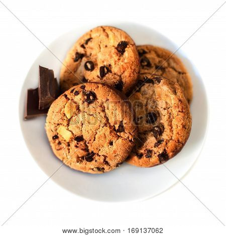 Chocolate chip cookies macro isolated on white background. Closeup of a group of assorted cookies with chocolate chunks.