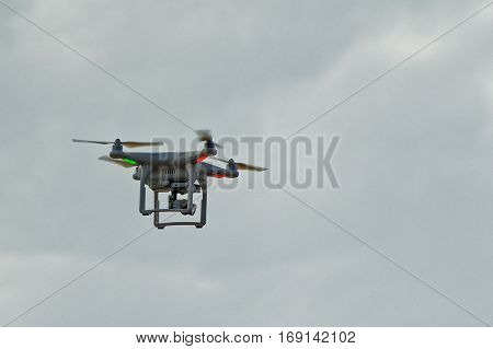 Quadro-copter conducts supervision and a video shooting from height of the bird's flight.