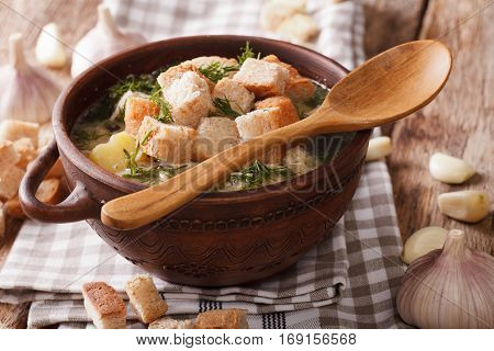 Garlic Soup With Croutons Close-up In A Bowl. Horizontal
