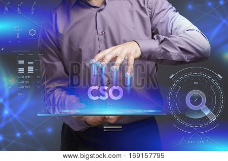 Business, Technology, Internet And Network Concept. Young Businessman Shows The Word On The Virtual