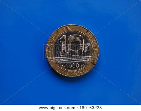 10 Francs Coin, France Over Blue
