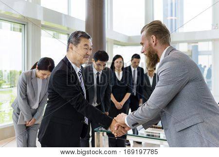 Business Partners Introductionary Handshake Bow