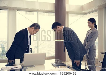 Business Partners Introductionary Handshake Bow