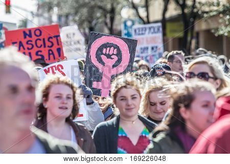 Woman Holding Pink Female Symbol At March