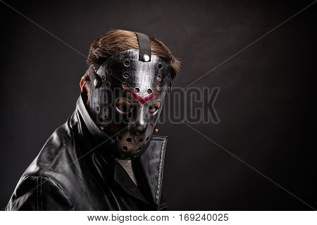 Bloody murderer in hockey mask portrait