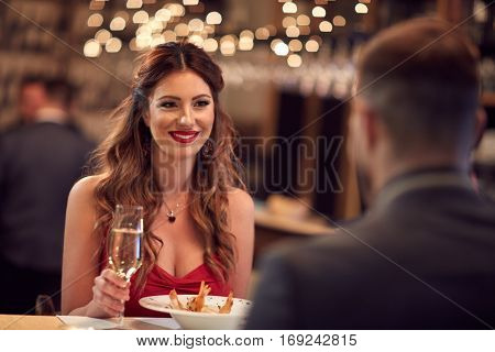 Couple celebrate Valentine's day with romantic dinner in restaurant