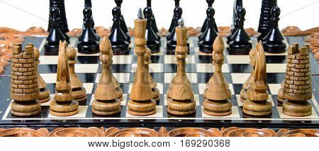 The Chess Pieces Are Placed On The Chessboard.