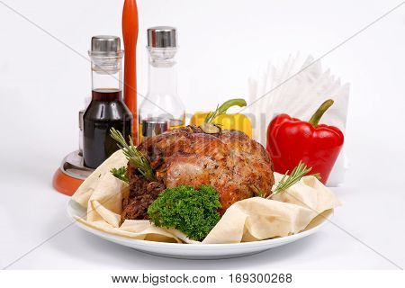 Roast leg of lamb on a pita with greens