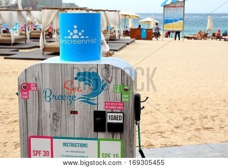 DUBAI UAE - JANUARY 24: Spray-on sunscreen machine "Sunscreen Mist" on the Jumeirah Beach Residence beach in Dubai Marina on January 24 2017 Dubai UAE.
