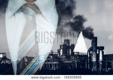 Double Exposure Smokestack In Factory Polution With Business Man , Business Man Factory Concept.