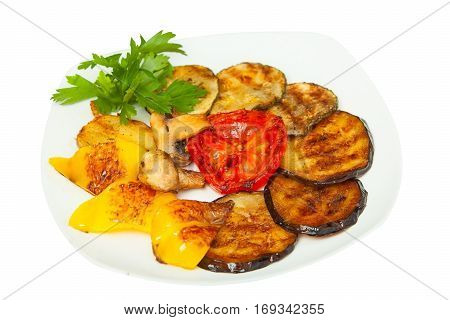delicious appettnye grilled vegetables on a beautiful plate on a white background