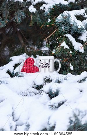 white cup with text or inscription 