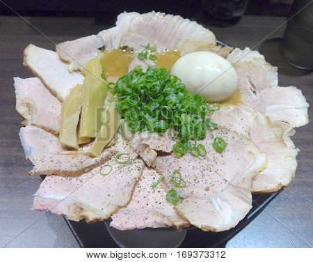 Japanese ramen with esgg and green onions closeup