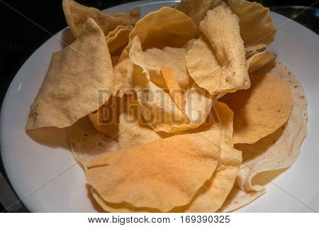 Chapati or indian bread on white dish