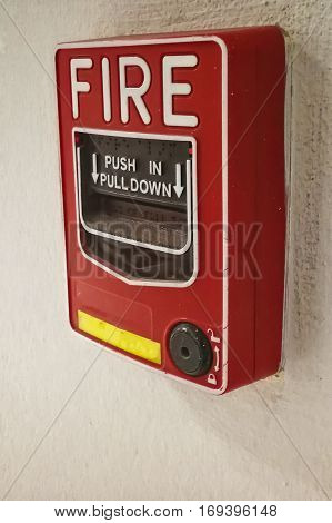 The fire alarm system. The fire alarm switch.