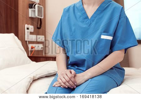 patient hospital sitting bed