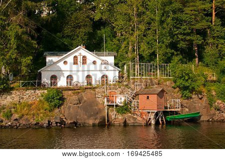 The water pumping station and the house. Karelia Valaam Island.