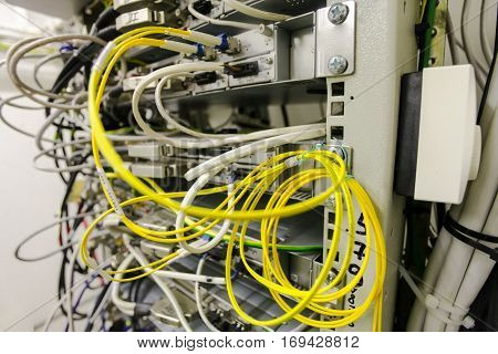 Equipment of radio base station yellow optic patch cords. Internet. Communication. Network