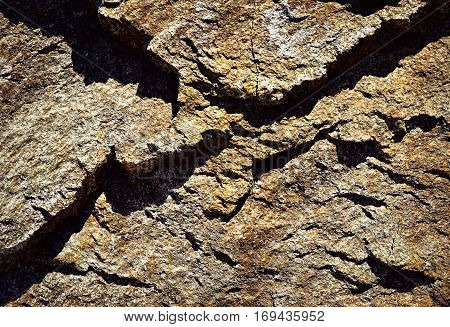 abstract background shadows liven up the granite rock