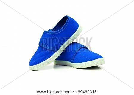 Blue slip on shoes isolated on white