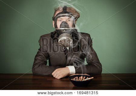 Teenage Boy Wearing A Gas Mask