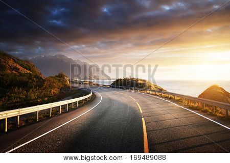 oad by the sea in sunrise time, Lofoten island, Norway