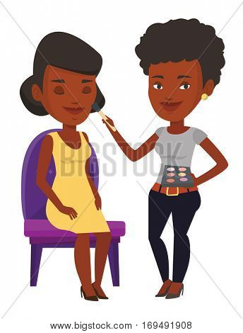 An african visagiste applying makeup on woman face. Visagiste doing makeup to young girl. Visagiste doing makeup to a model using a brush. Vector flat design illustration isolated on white background.