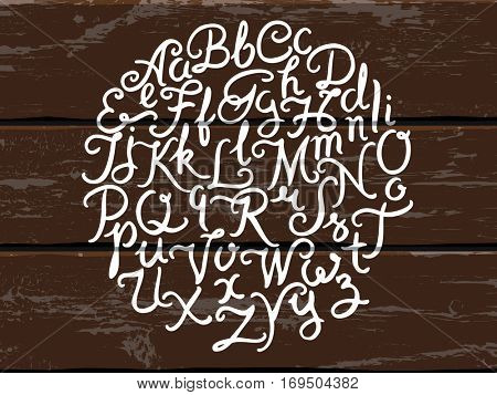 Handwritten alphabet vector font. Hand drawn brush script letters on the old painted wood panels background. Stock vector lettering typography
