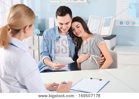 Future parent with doctor at the hospital