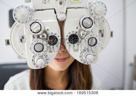 Young woman doing eye test