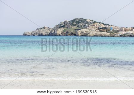 Rocks by the Mediterranean sea on the island of Ibiza in Spain, holiday and summer scene