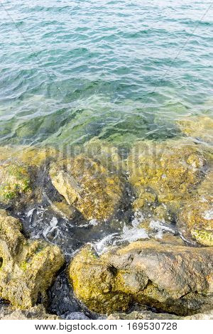 Vacation, Rocks by the Mediterranean sea on the island of Ibiza in Spain, holiday and summer scene