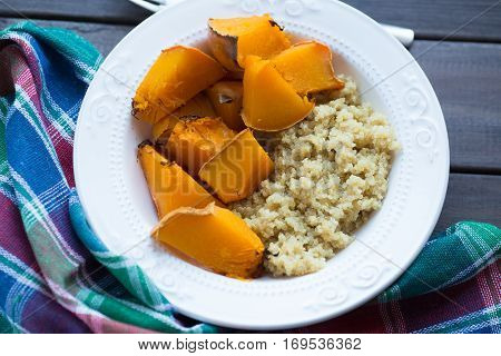 a dish of cooked pumpkin and quinoa. Top view