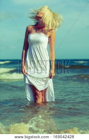 Young Woman Chilling Out On The Beach.