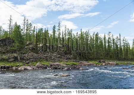 Beautiful cliffs and rapids on the river. Eastern Siberia. Krasnoyarsk territory.