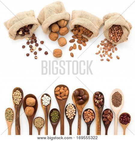 Different Kind Of Beans And Lentils In Wooden Spoon On White Wood Background. Mung Bean, Groundnut,