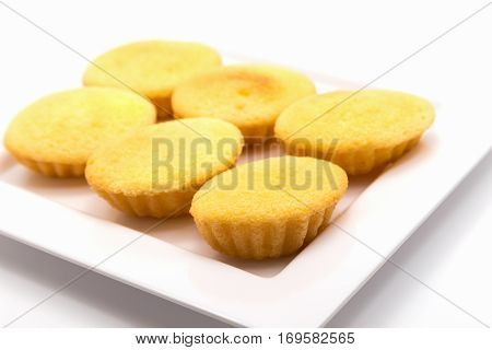 Castella or egg cakes on white plate isolated on white background