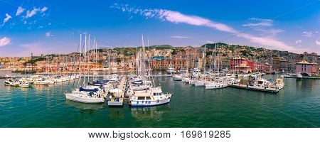 Panorama of marina Porto Antico Genova, where many sailboats and yachts are moored, Genoa, Italy.