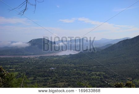 Mountain range and river in the morning.