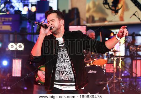 NEW YORK-DEC 31: Recording artist Luke Bryan performs onstage during Dick Clark's New Year's Rockin' Eve at Times Square on December 31, 2015 in New York City.