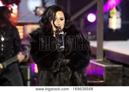 NEW YORK-DEC 31: Recording artist Demi Lovato performs during Dick Clark's New Year's Rockin' Eve at Times Square on December 31, 2015 in New York City.