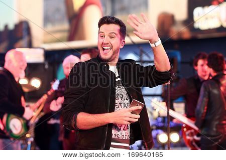 NEW YORK-DEC 31: Recording artist Luke Bryan performs during Dick Clark's New Year's Rockin' Eve at Times Square on December 31, 2015 in New York City.