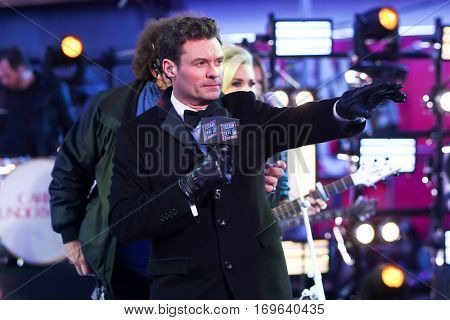 NEW YORK-DEC 31: Host Ryan Seacrest onstage during Dick Clark's New Year's Rockin' Eve at Times Square on December 31, 2015 in New York City.