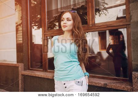 girl photographed with fruit uses the means of communication sitting in cafe