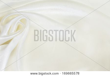 Closeup of white silk drapery for background
