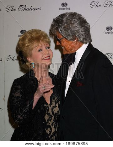 LOS ANGELES -OCT 11:  Debbie Reynolds, Gregg Juarez arrive at the Thalians Ball at the Century Plaza Hotel on October 11, 2003 in Century City, CA 