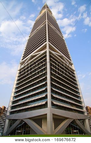 RIYADH - AUGUST 22: Sunset light at Al Faisaliah tower facade on August 22, 2016 in Riyadh, Saudi Arabia. Al Faisaliah towers is a luxury hotel and the most distinctive skyscraper in Saudi Arabia