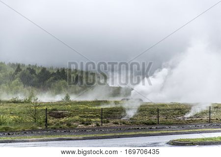 The Great Geysir Strokkur in Iceland hot fog geology