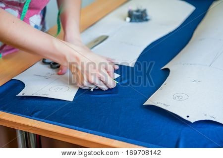 Cliose Up Tailor Measuring Textile Material. Selective Focus
