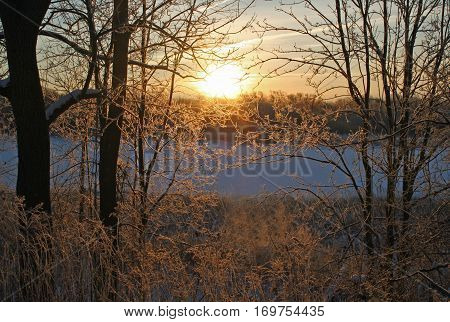 Watching a wintery sunrise on the Grand River